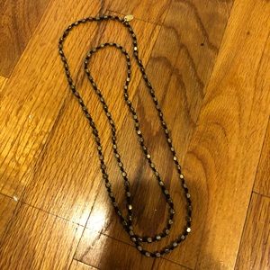 Black and gold Betsy Prittard Design necklace